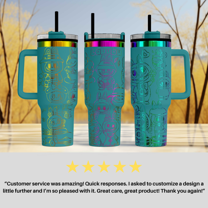 three colorful teal-colored tumblers with unique designs, including cartoon-like characters and patterns. The tumblers are placed side by side, with a blurred background that appears to be a natural outdoor setting with trees.