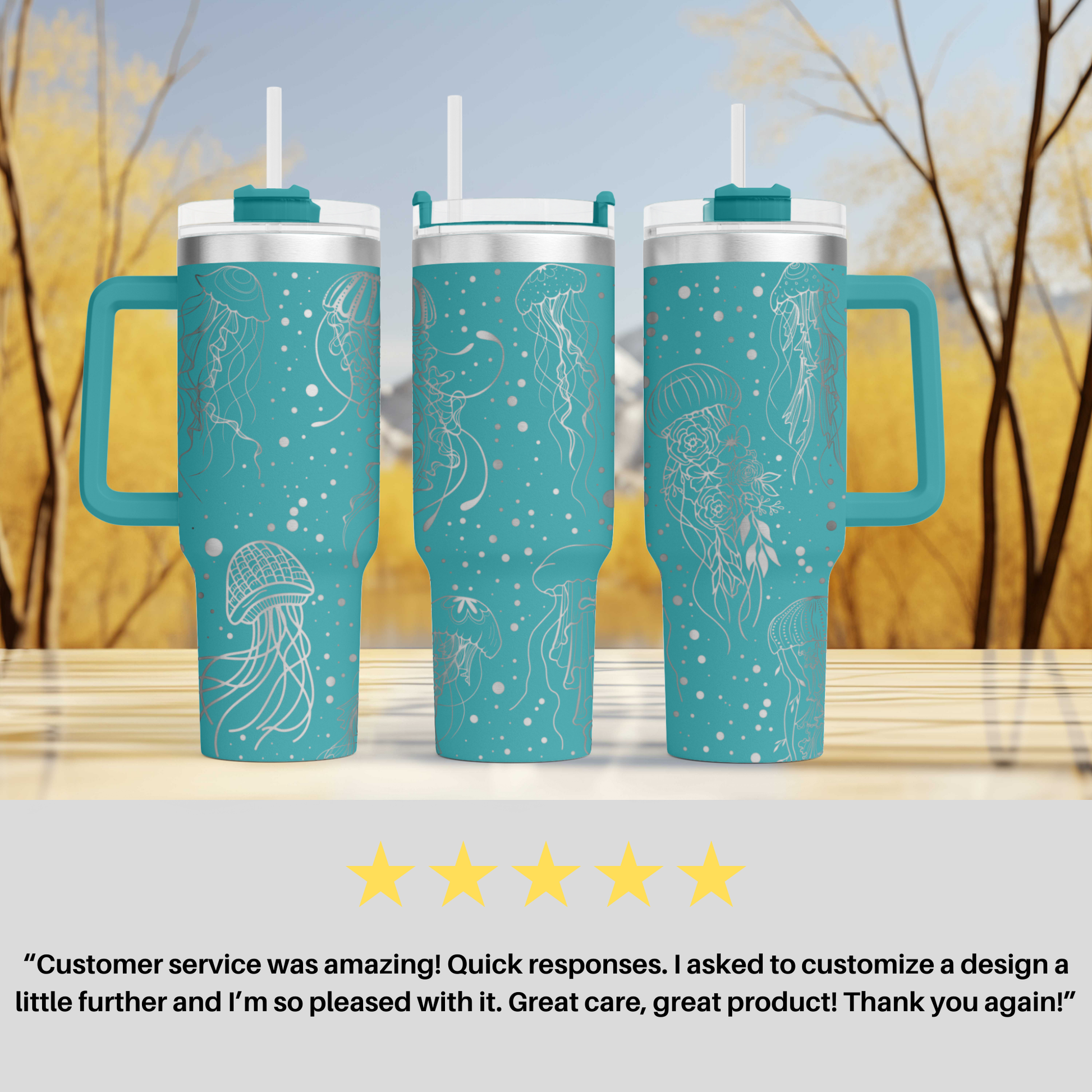 three travel mugs sitting on top of a table