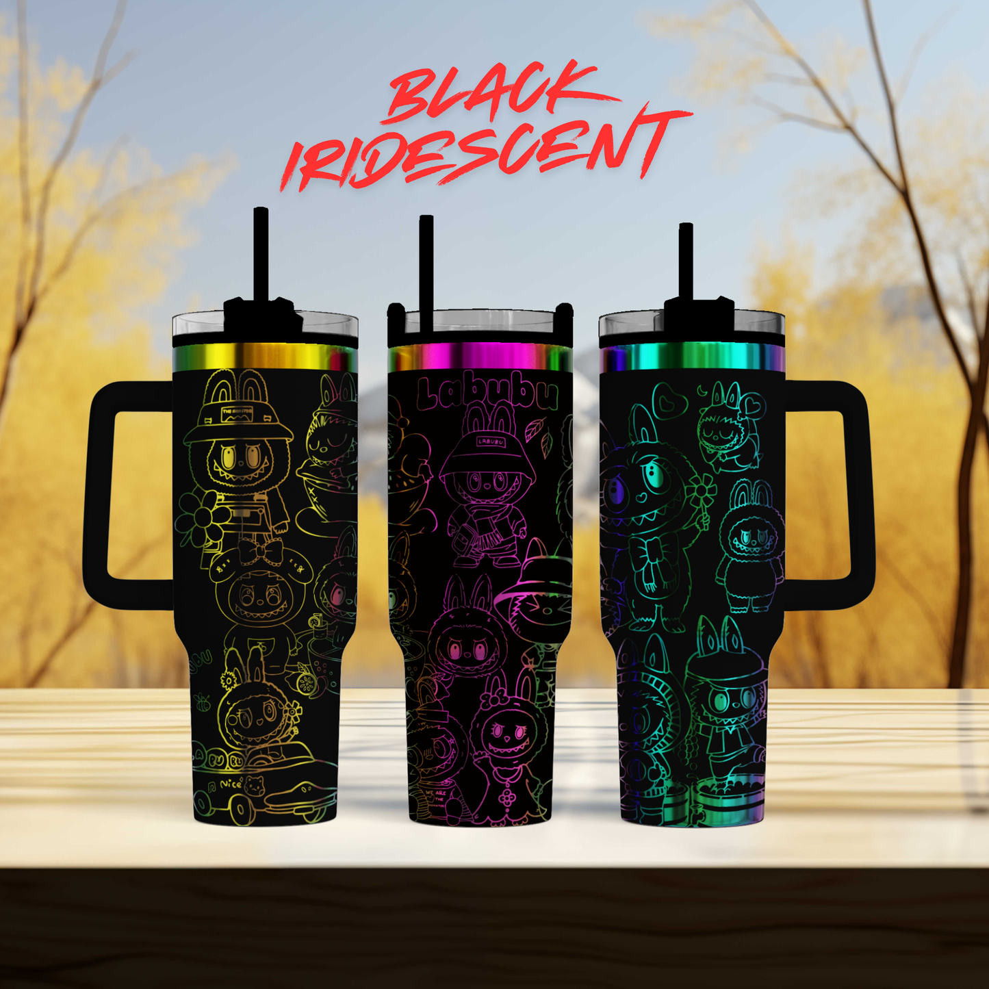 three colorful, cartoon-style tumblers with handles, arranged in a row on a wooden surface.
