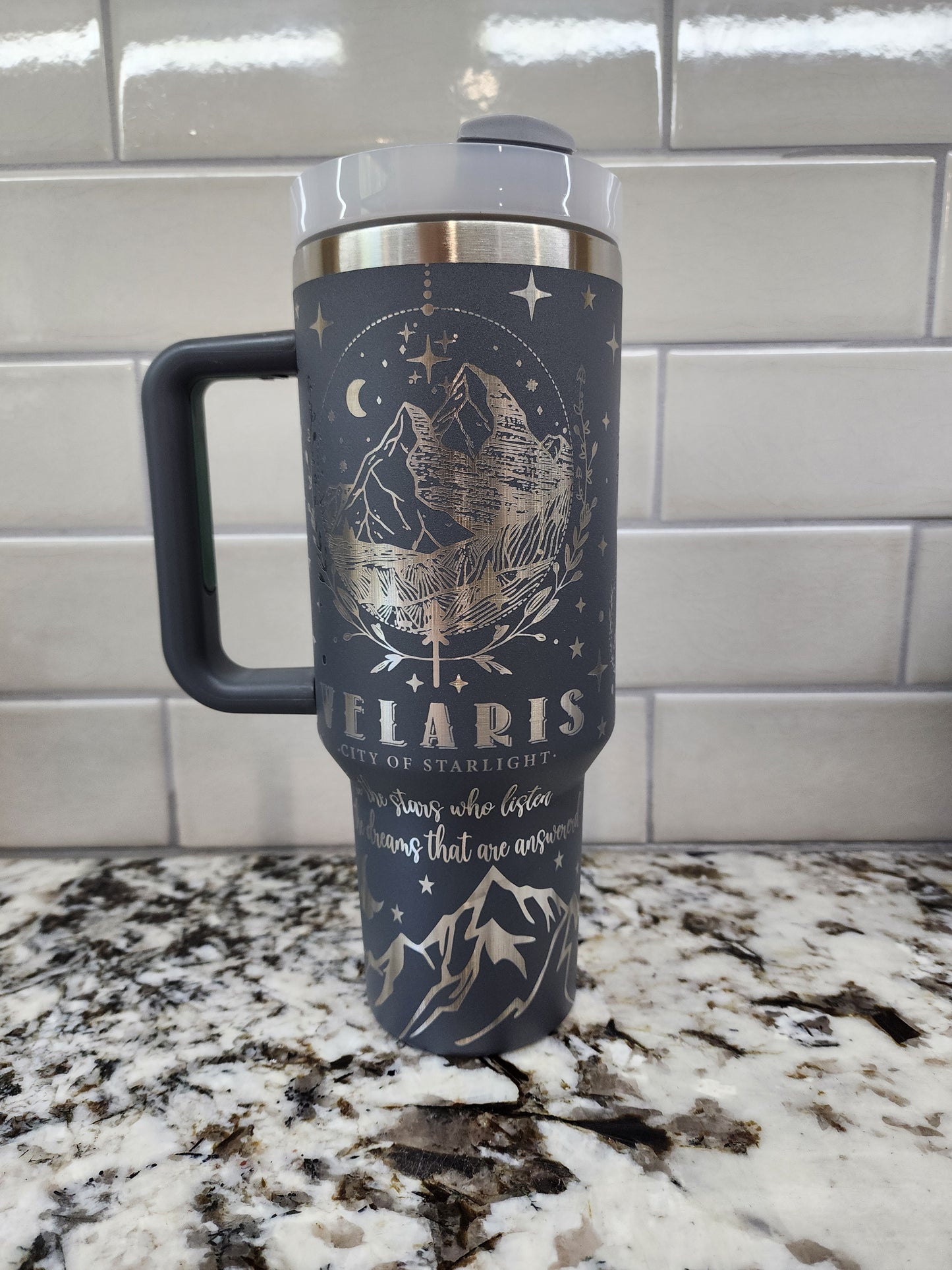 a bottle of wine is hanging on the wall