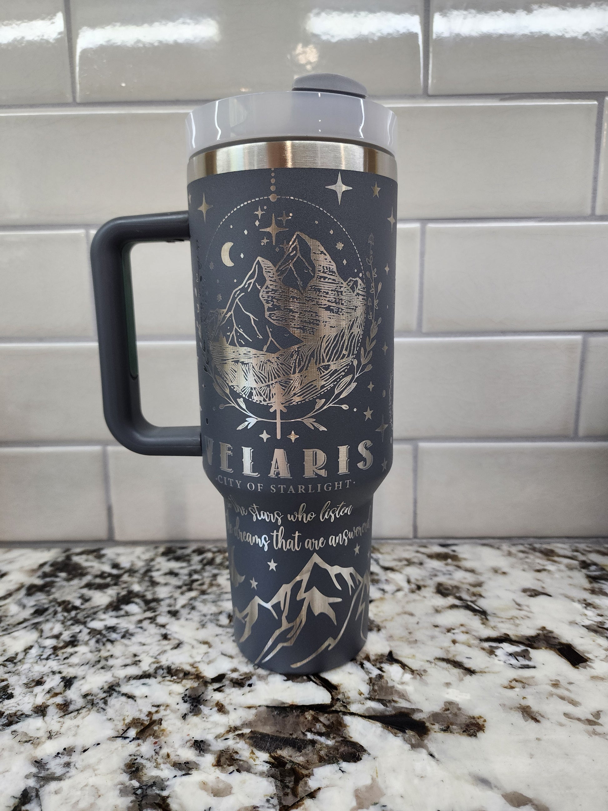 a bottle of wine is hanging on the wall