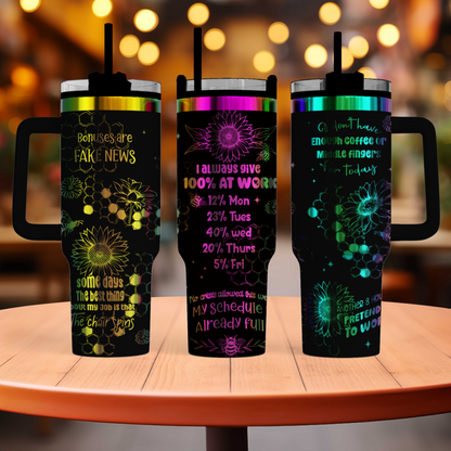 three travel mugs sitting on top of a table