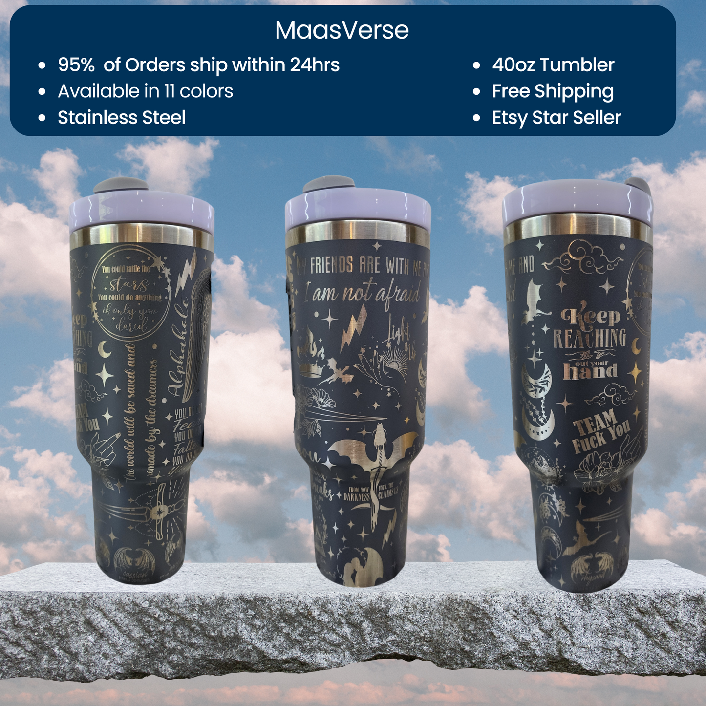 three travel mugs sitting on top of a rock