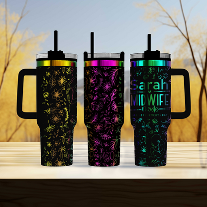 three travel mugs sitting next to each other on a table