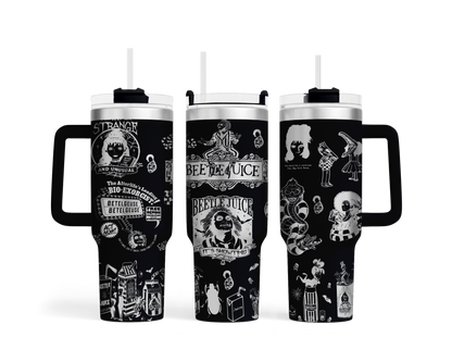 three travel mugs with different designs on them