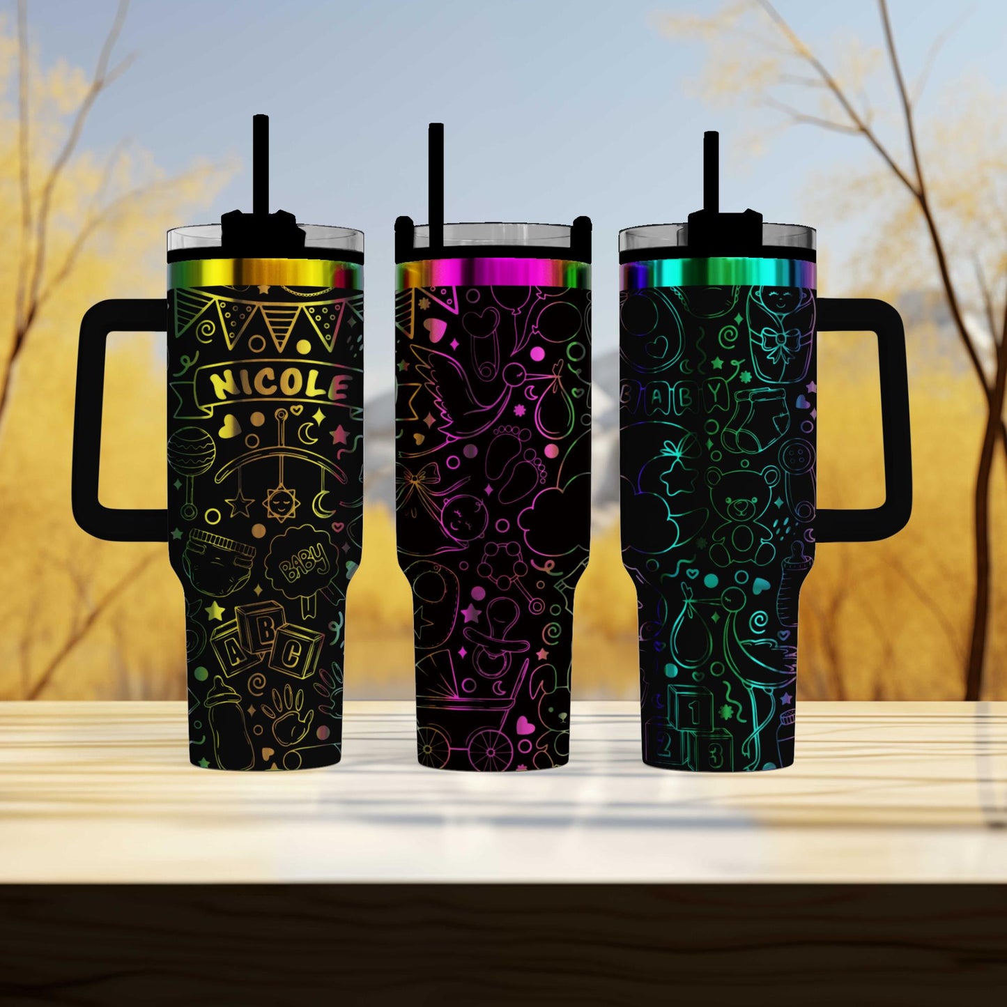 three travel mugs sitting on top of a wooden table