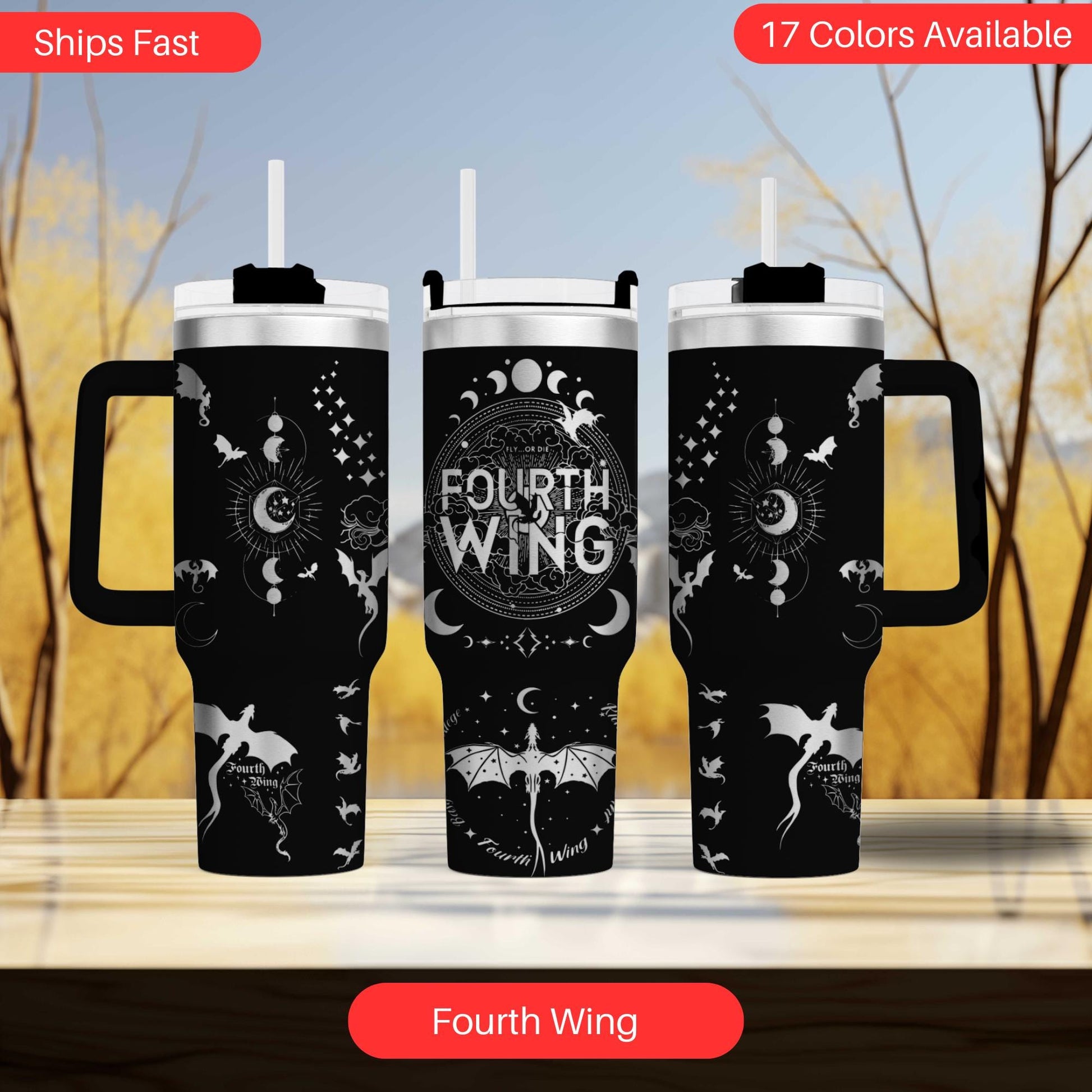 a couple of travel mugs sitting on top of a table
