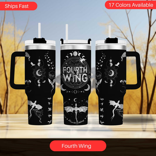 a couple of travel mugs sitting on top of a table