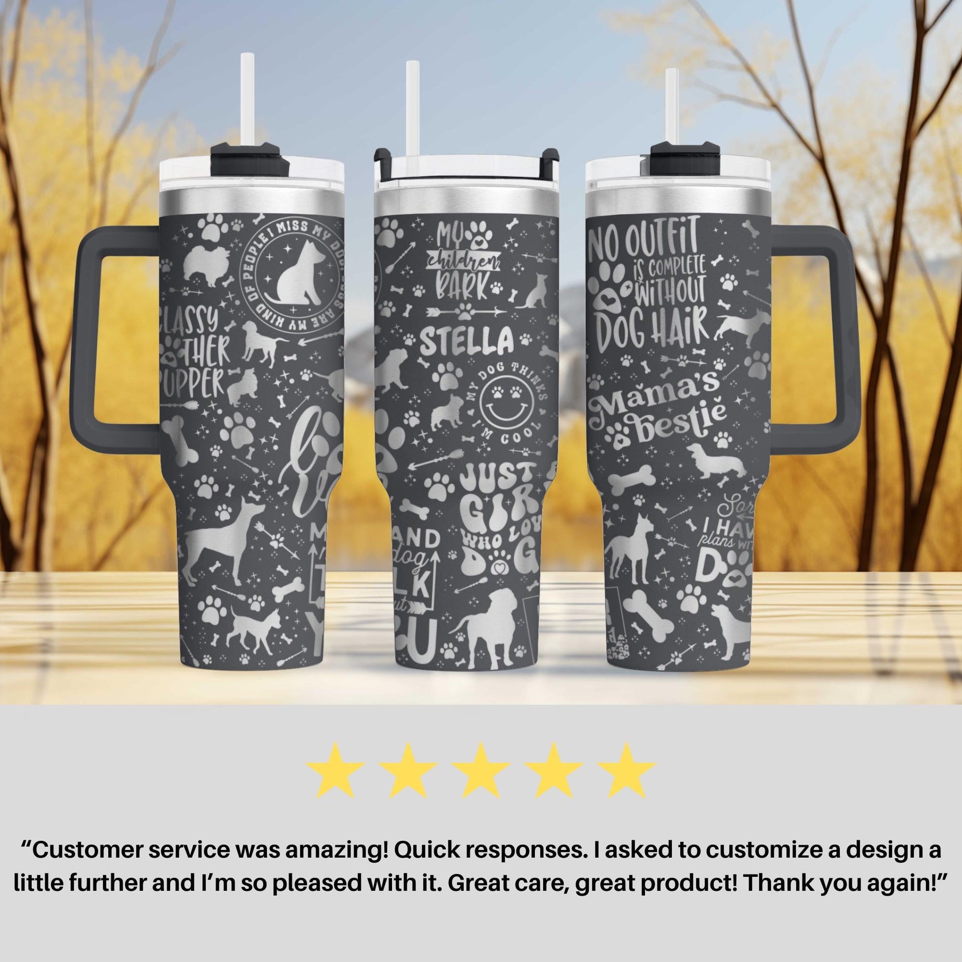 three travel mugs sitting on top of a table