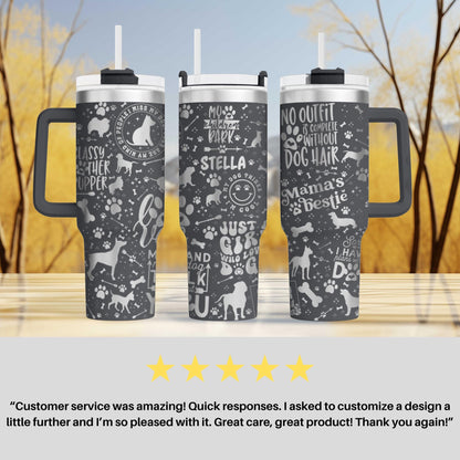 three travel mugs sitting on top of a table