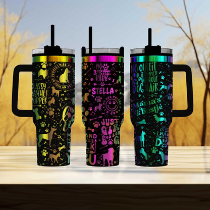 three colorful tumblers sitting on top of a wooden table