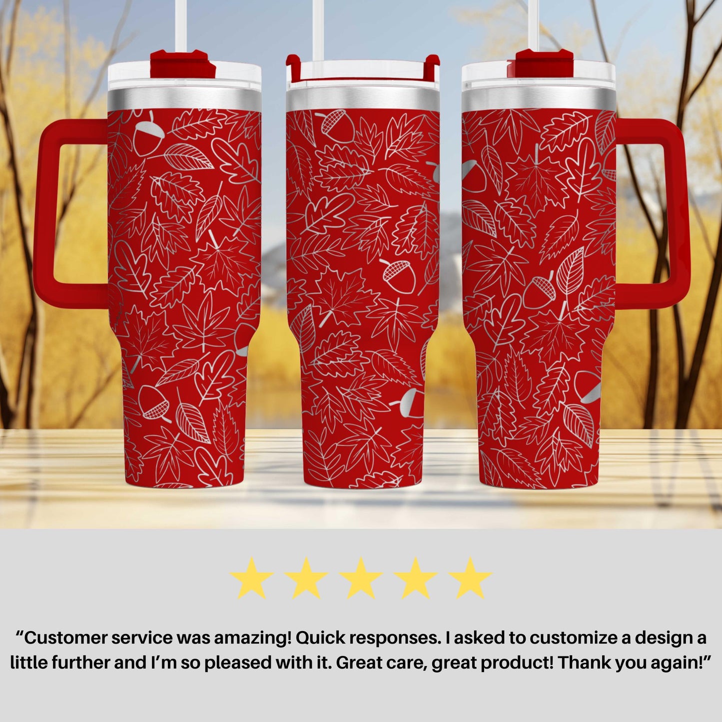 three red travel mugs sitting on top of a table