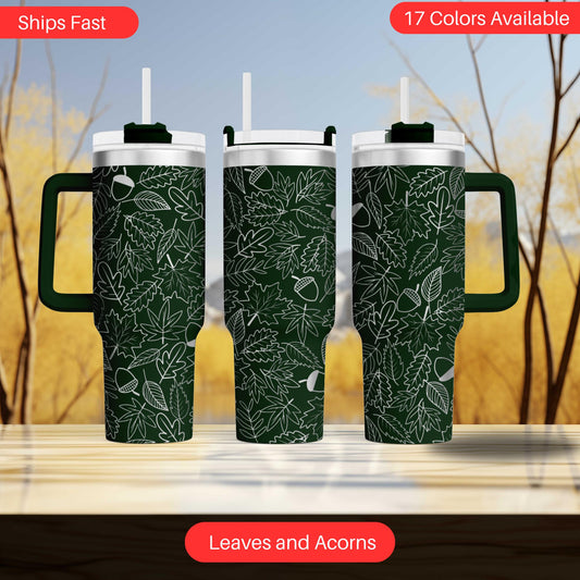 two green coffee mugs sitting on top of a table