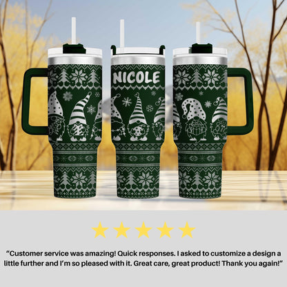 a couple of green coffee mugs sitting on top of a table
