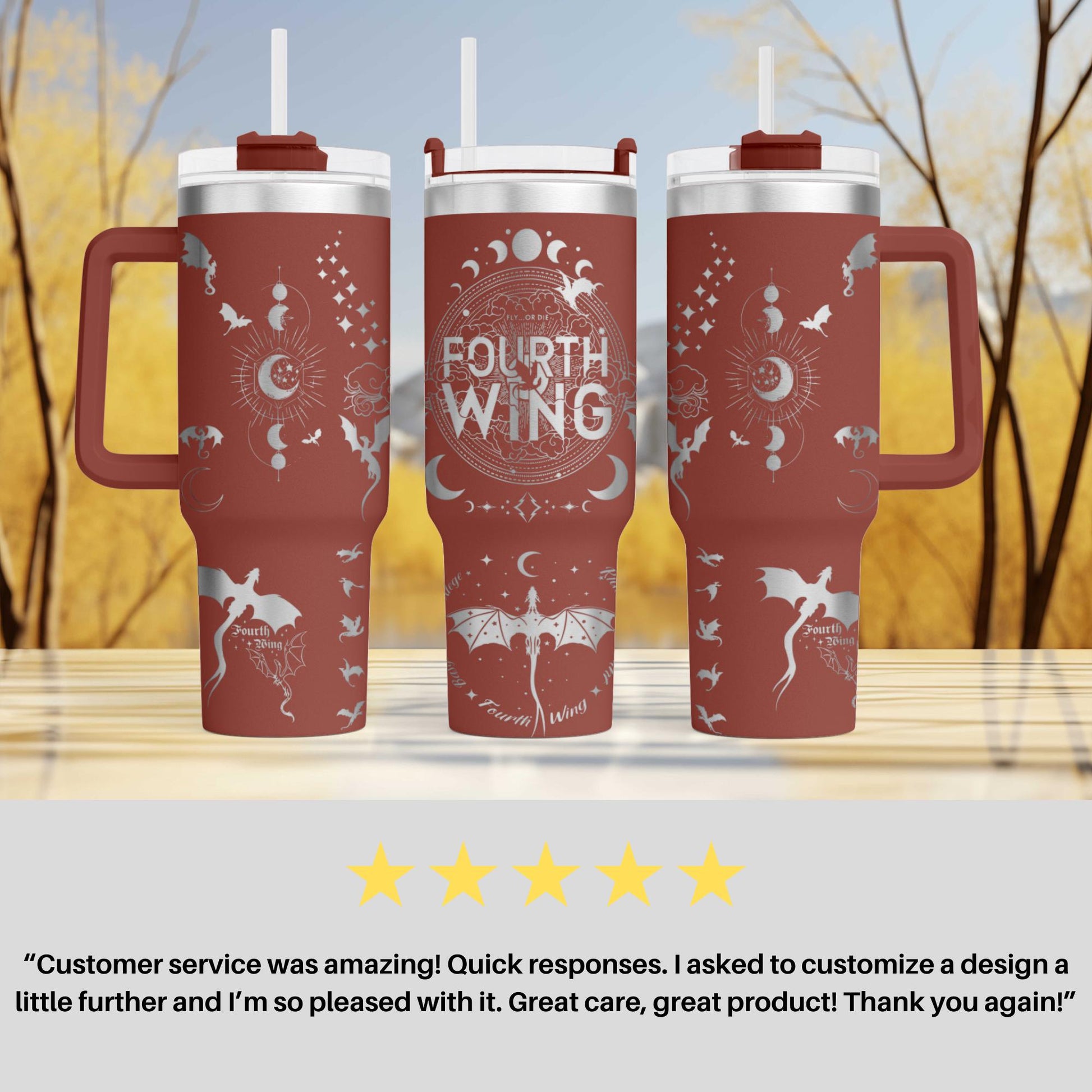 three red travel mugs sitting on top of a table