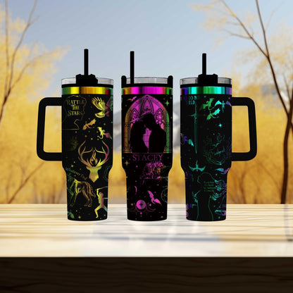 three travel mugs sitting on top of a wooden table