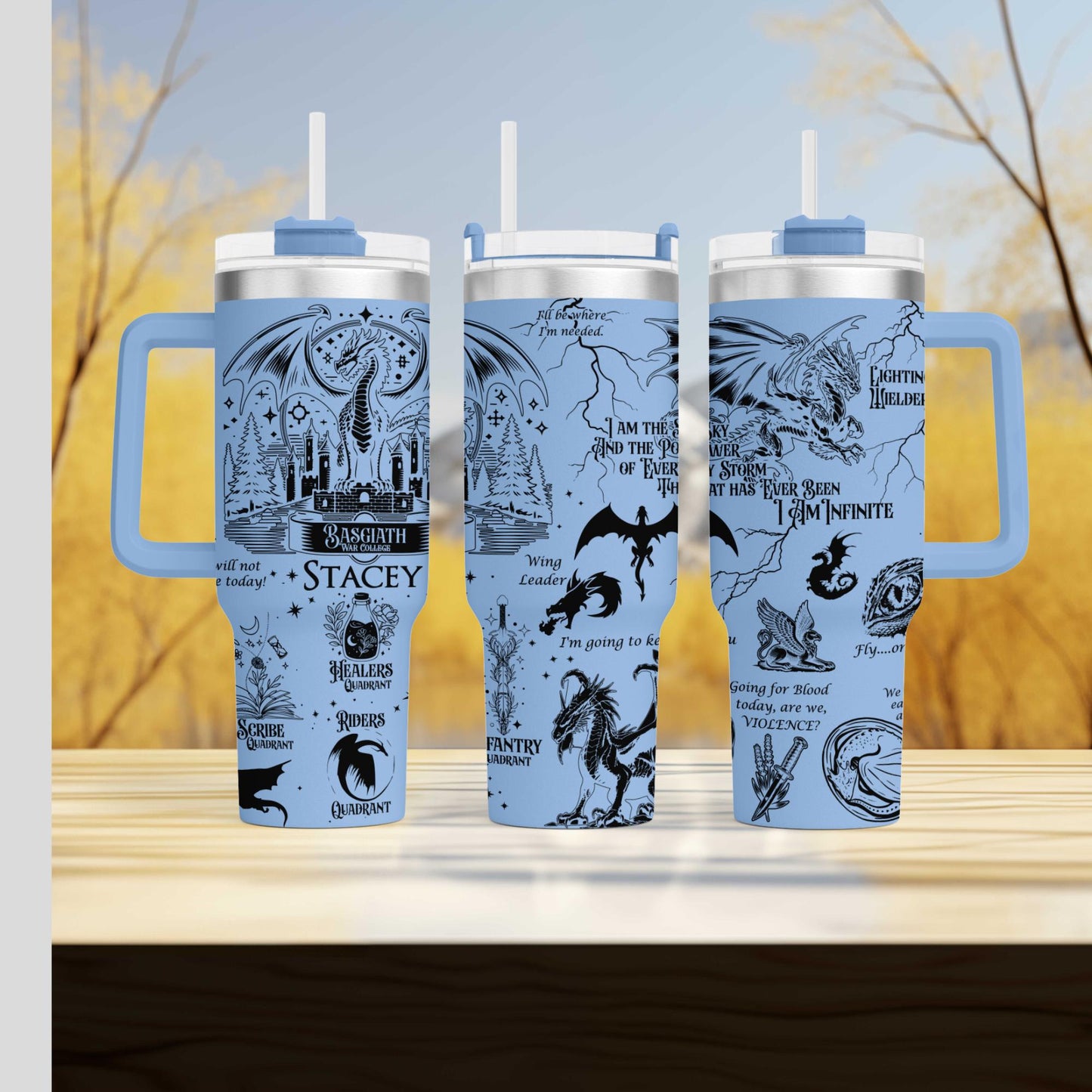 three travel mugs sitting on top of a wooden table