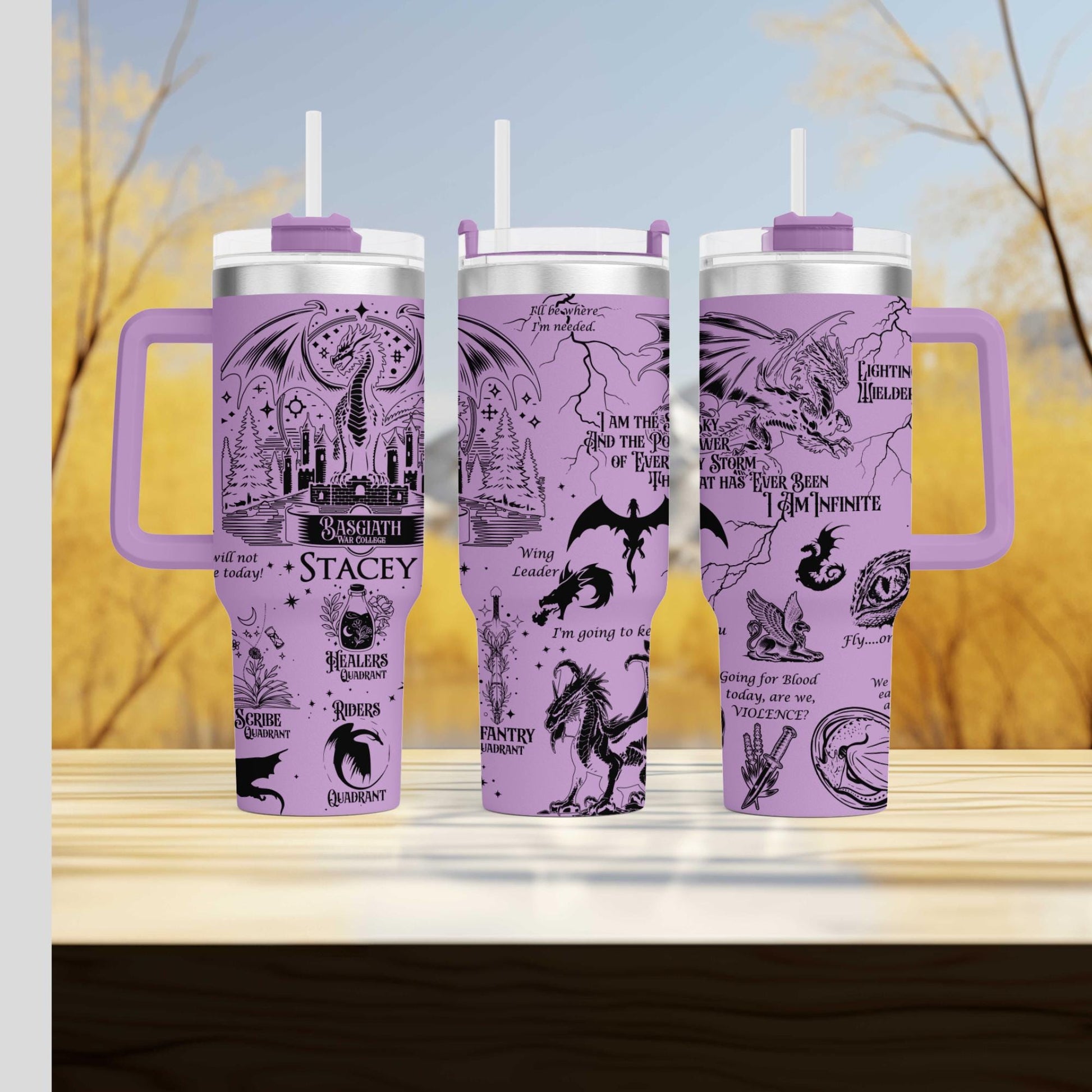 three travel mugs sitting on top of a wooden table