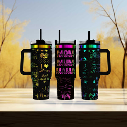 three travel mugs sitting on top of a wooden table