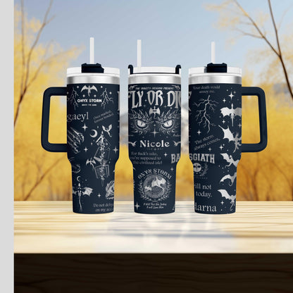 three travel mugs sitting on top of a wooden table