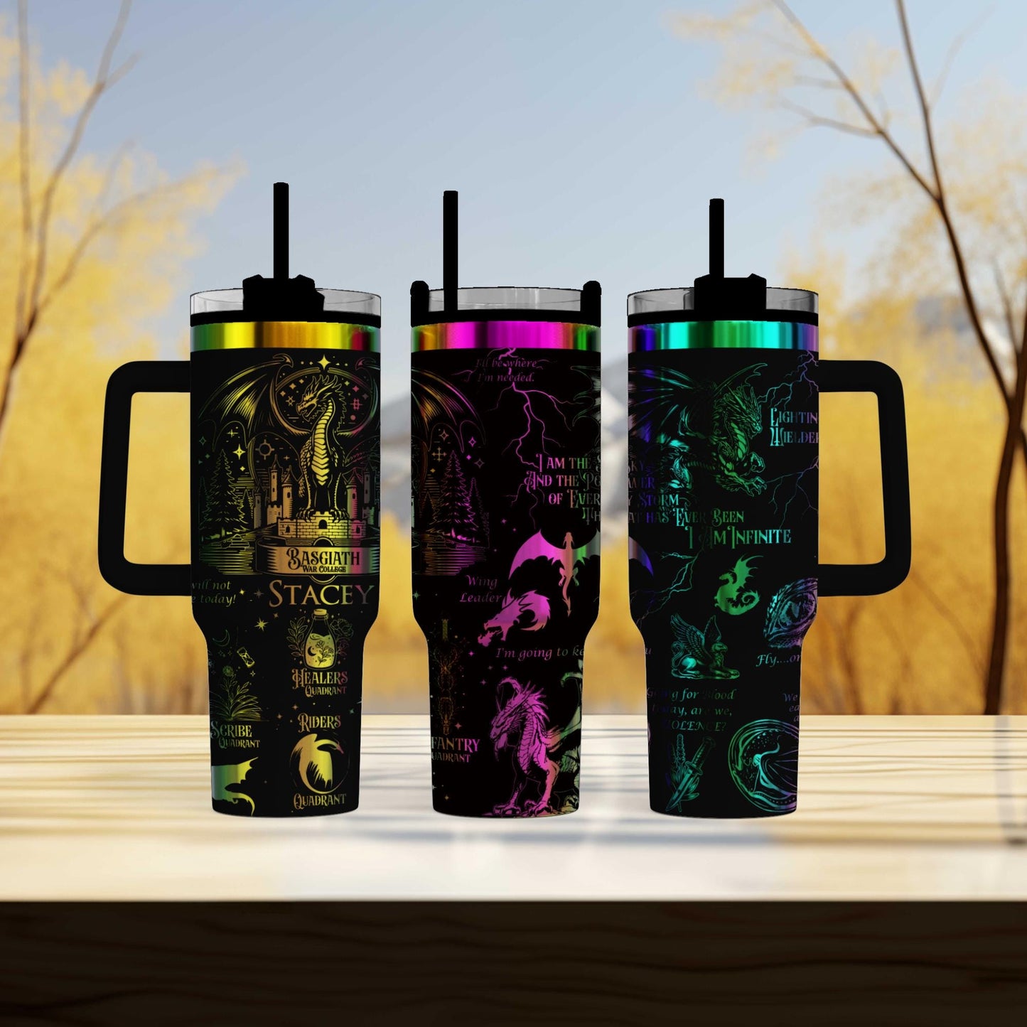 three travel mugs sitting on top of a wooden table