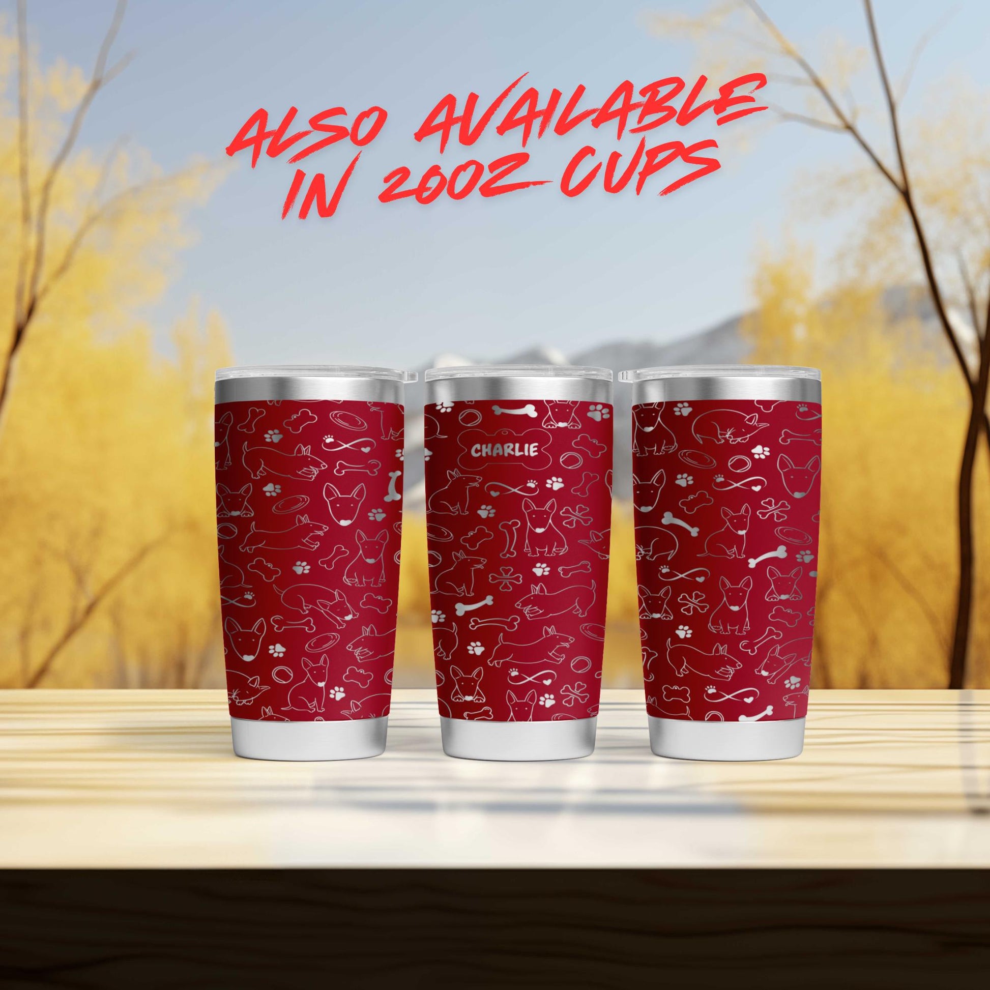 three red cups sitting on top of a wooden table