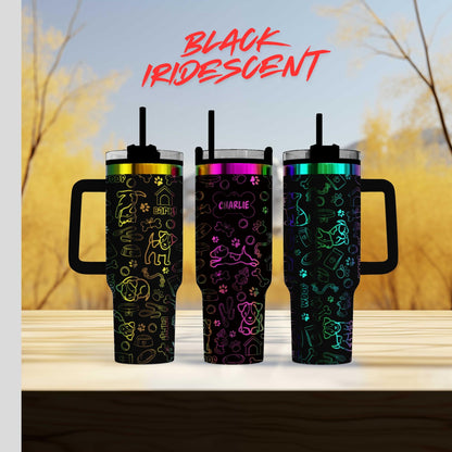 three different colored tumblers sitting next to each other