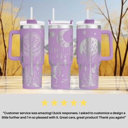 three travel mugs sitting on top of a table