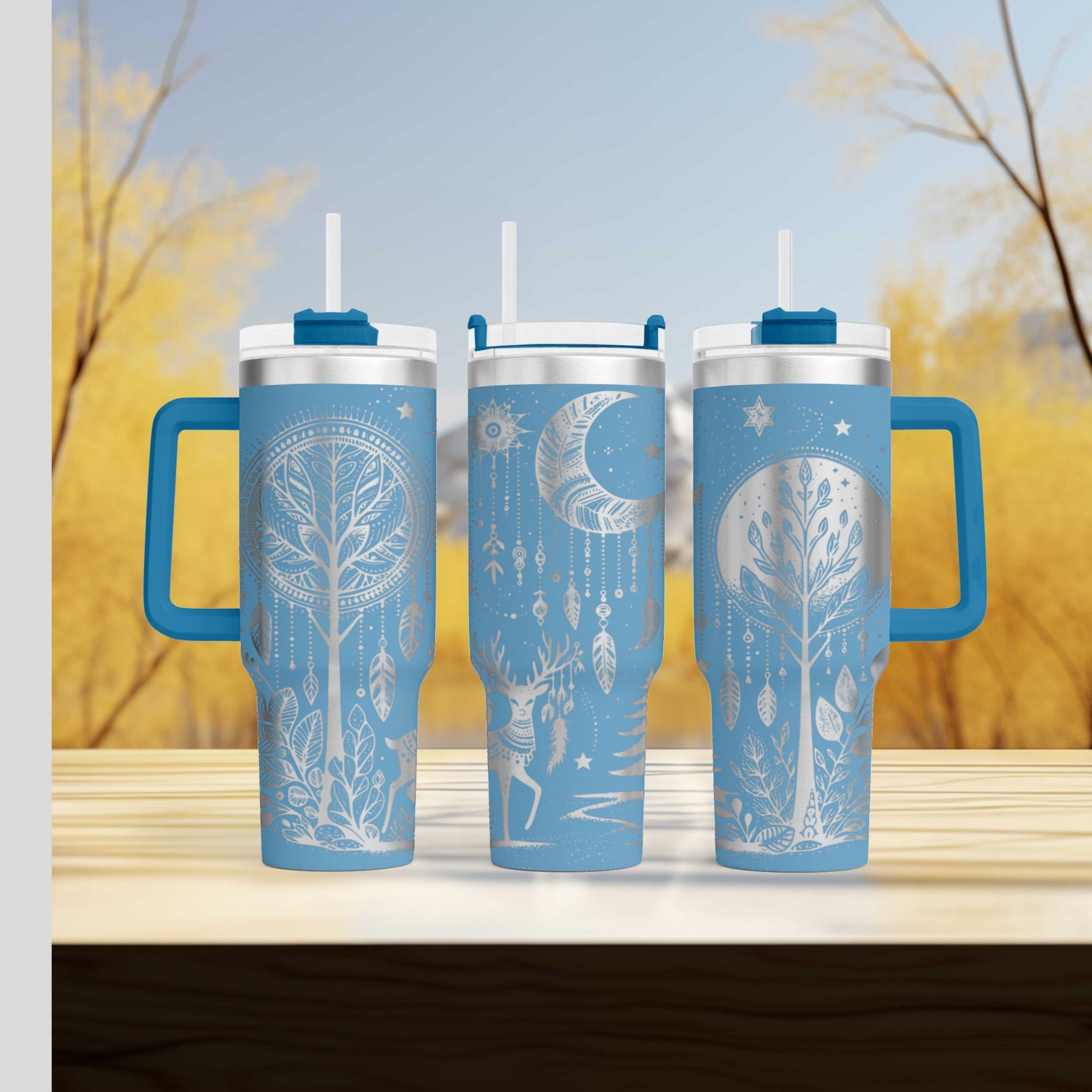 a couple of blue cups sitting on top of a wooden table