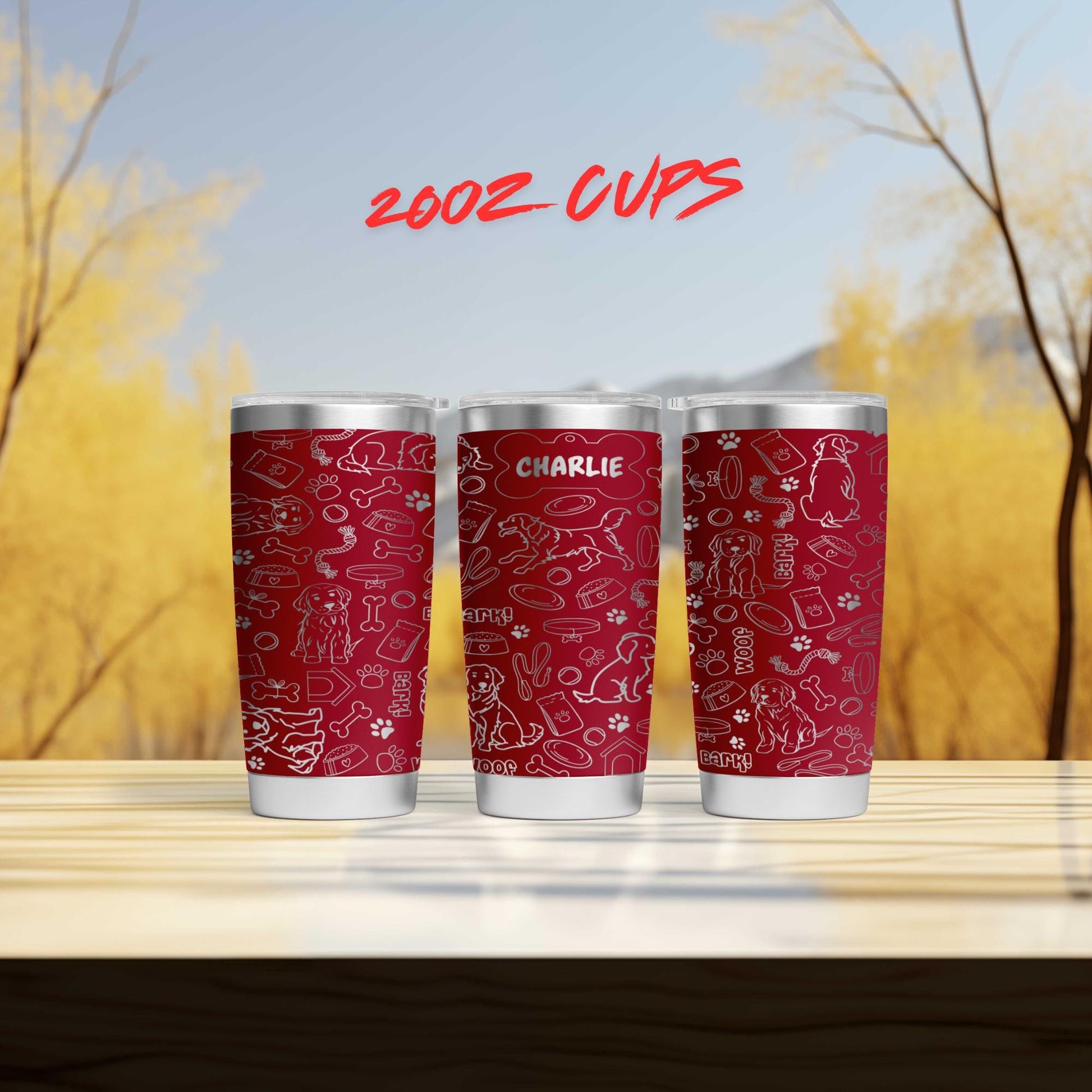 three red cups sitting on top of a wooden table