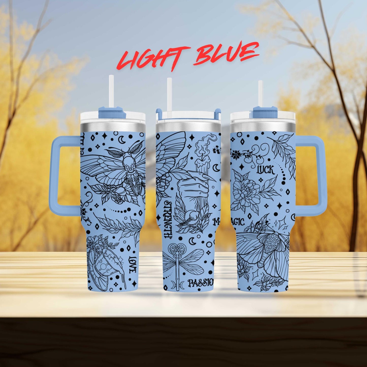 three tumblers sitting on top of a wooden table