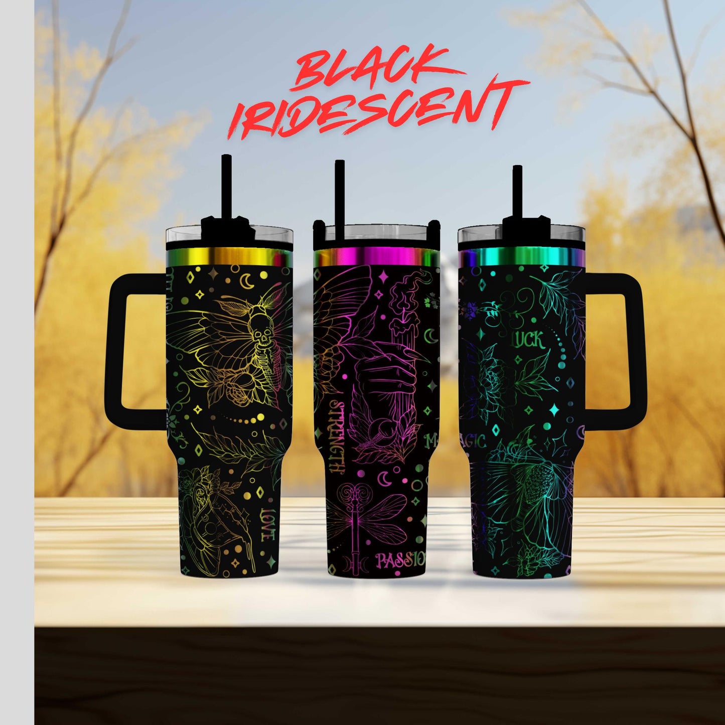 three colorful tumblers sitting on top of a wooden table
