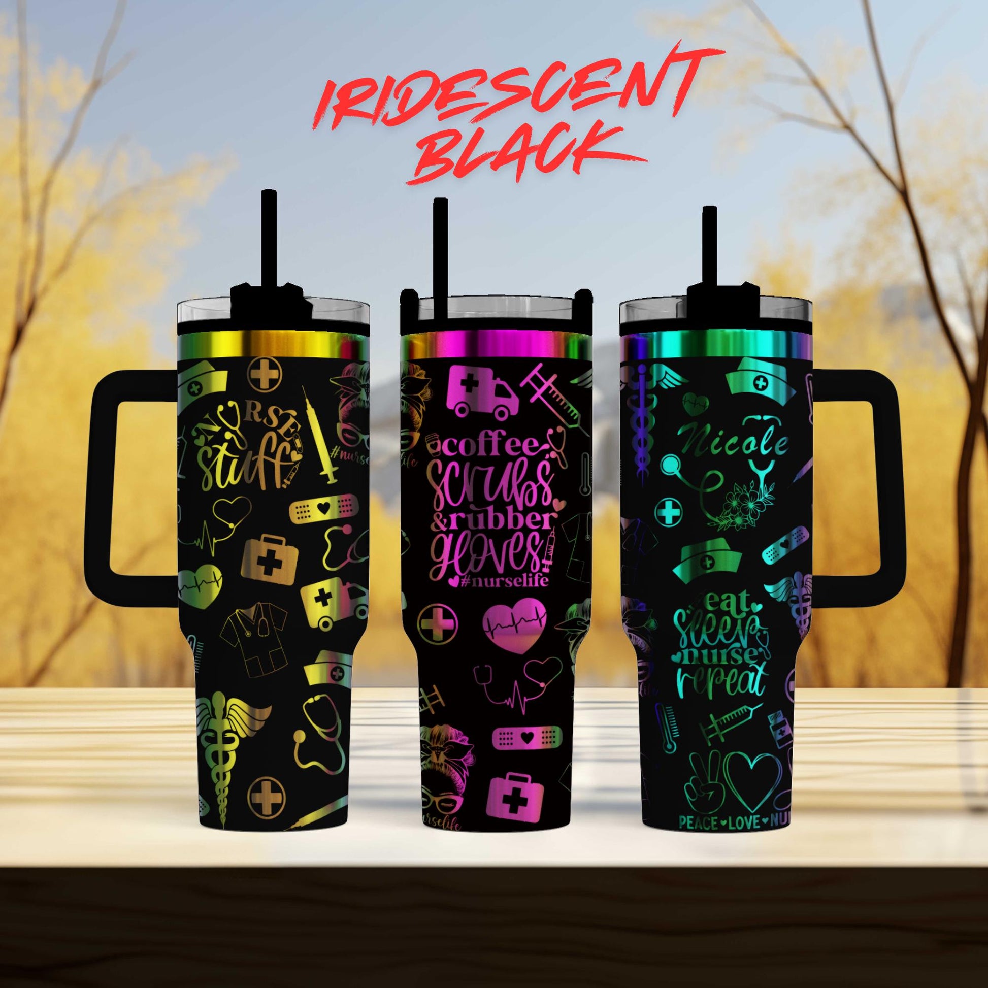 three travel mugs with different designs on them