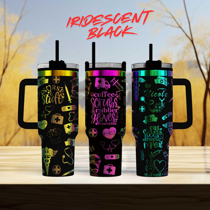 three travel mugs with different designs on them