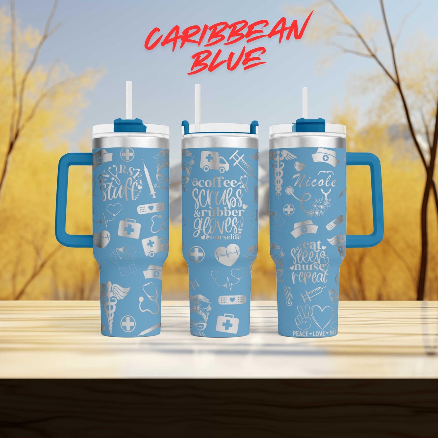 a couple of blue cups sitting on top of a wooden table