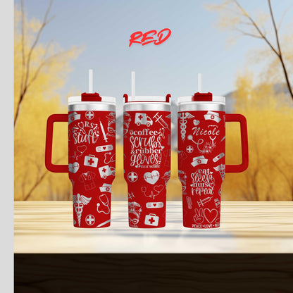 three red travel mugs sitting on top of a wooden table