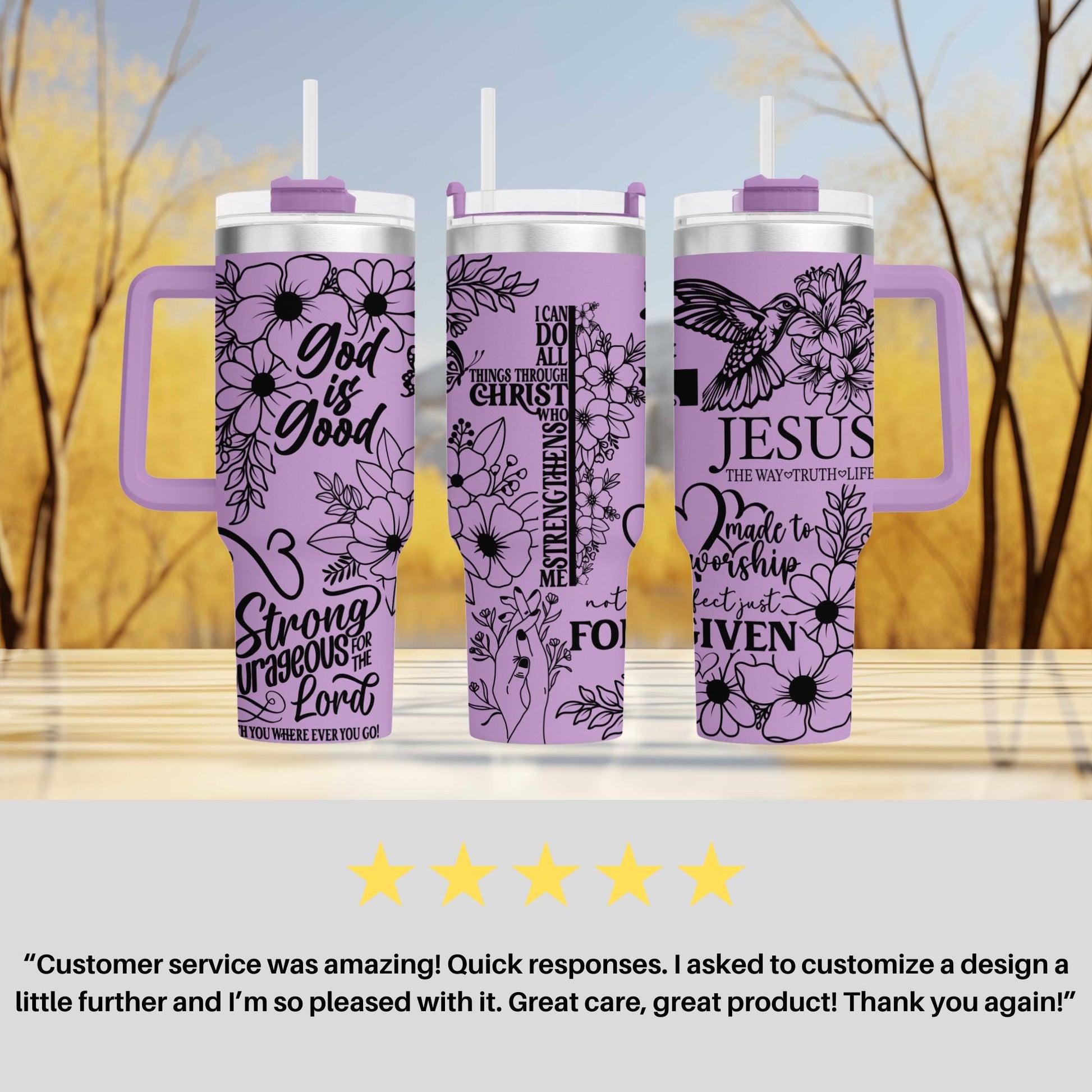 three purple travel mugs sitting on top of a table