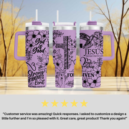 three purple travel mugs sitting on top of a table