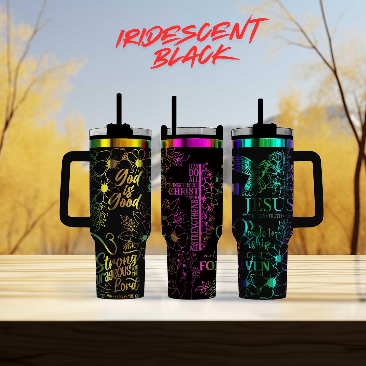 three colorful tumblers sitting on top of a wooden table