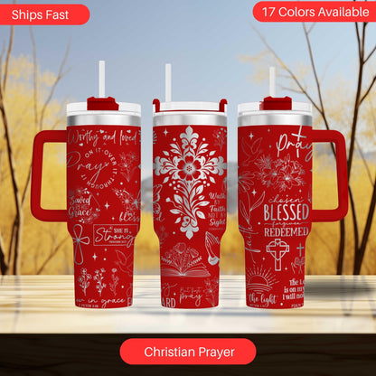 a set of three red travel mugs on a table