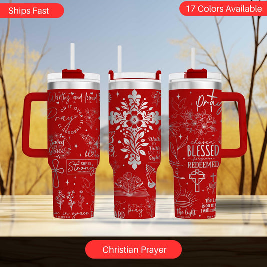 a set of three red travel mugs on a table