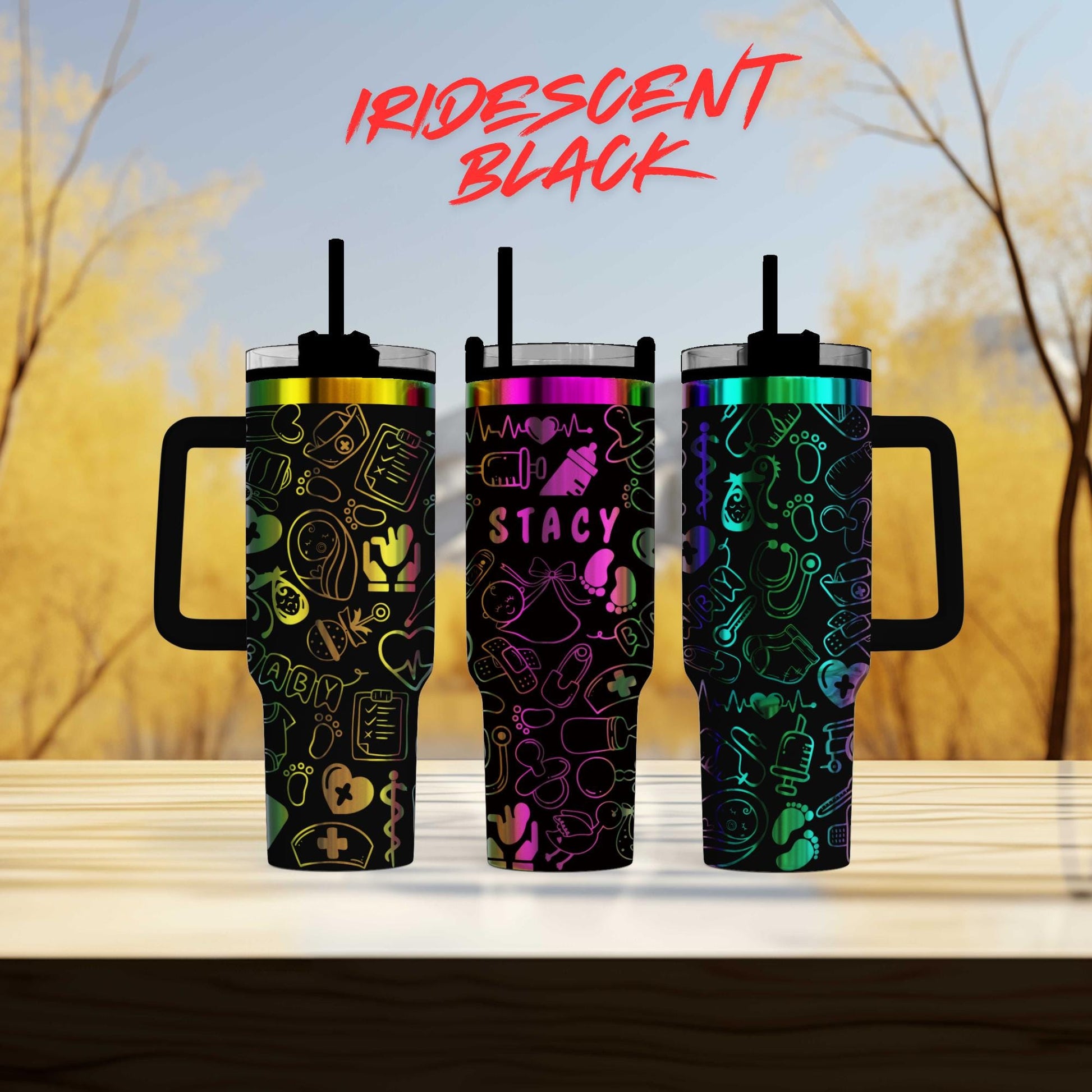three colorful tumblers sitting on top of a wooden table