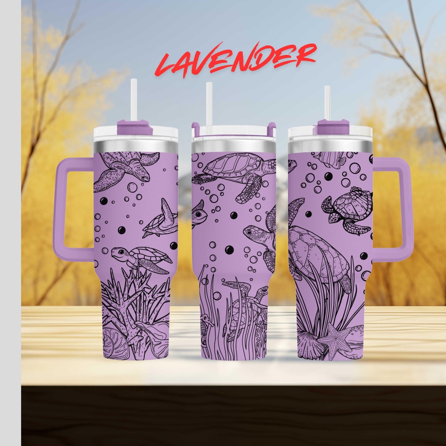 three travel mugs sitting on top of a wooden table