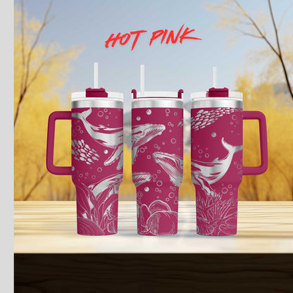 a couple of pink cups sitting on top of a wooden table