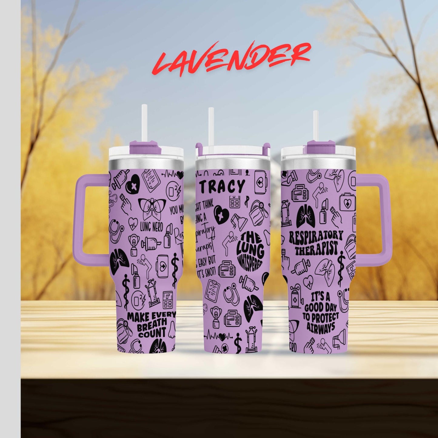 three travel mugs sitting on top of a wooden table