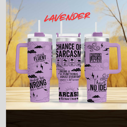 three travel mugs sitting on top of a wooden table