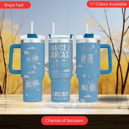 three travel mugs sitting on top of a table