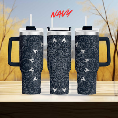 three travel mugs sitting on top of a wooden table