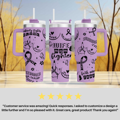 a set of three purple travel mugs sitting on top of a table