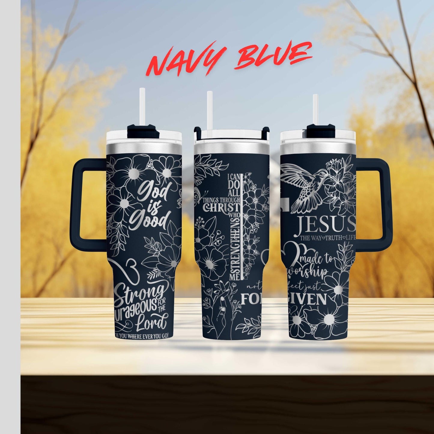 three travel mugs sitting on top of a wooden table